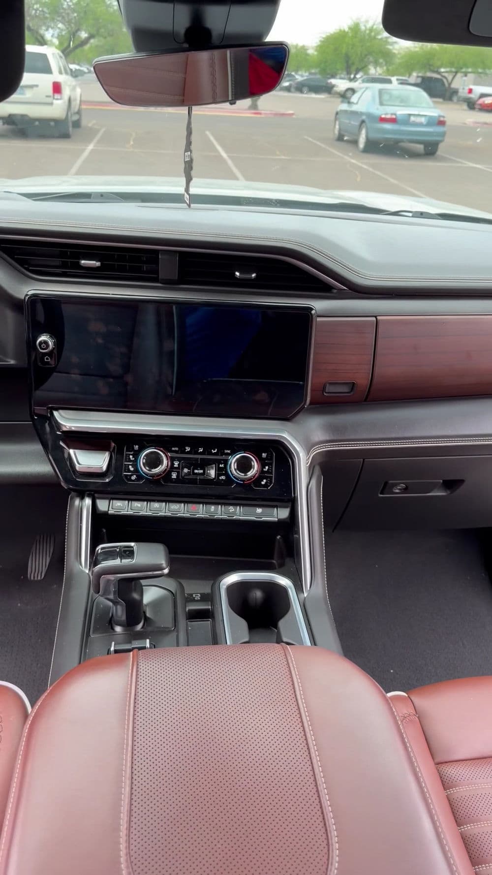 Modern car interior featuring a sleek dashboard and advanced infotainment system.