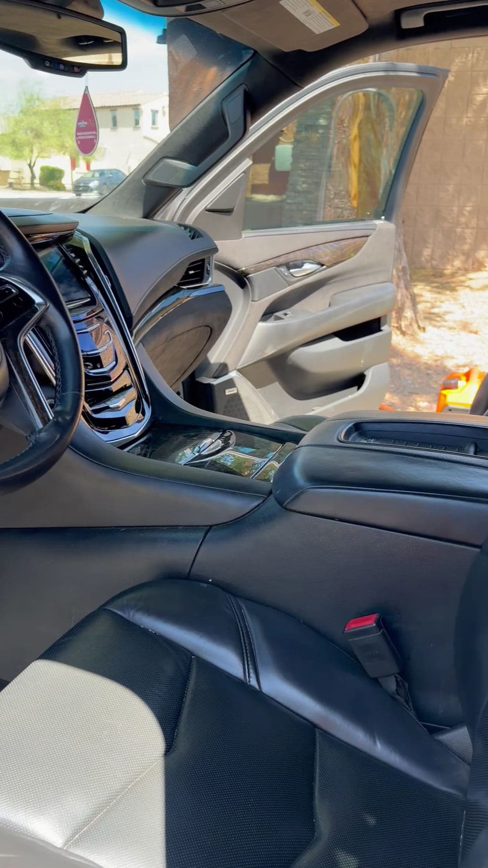 Interior of a luxury car showcasing sleek design and modern features.