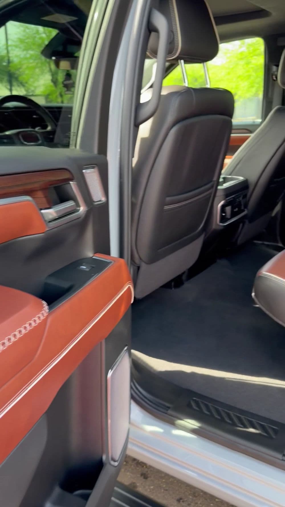 Luxurious truck interior showcasing leather seats and modern design details.