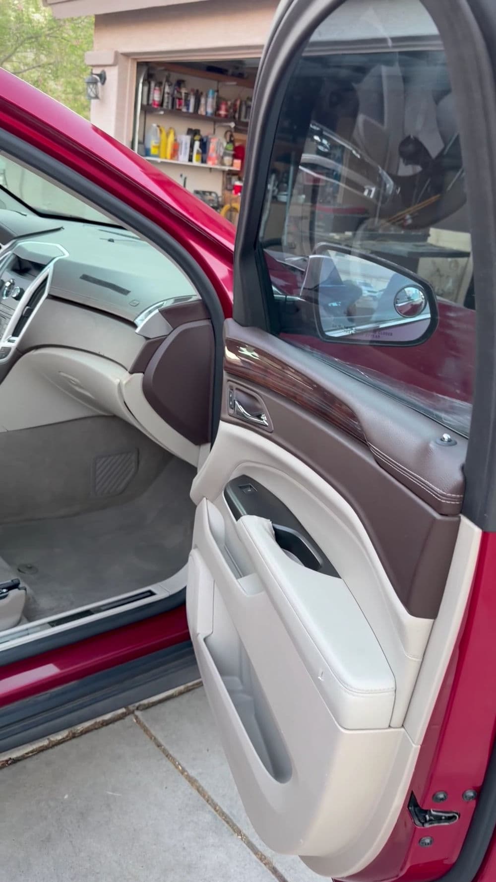 Interior view of a red vehicle showcasing leather seats and a premium dashboard.