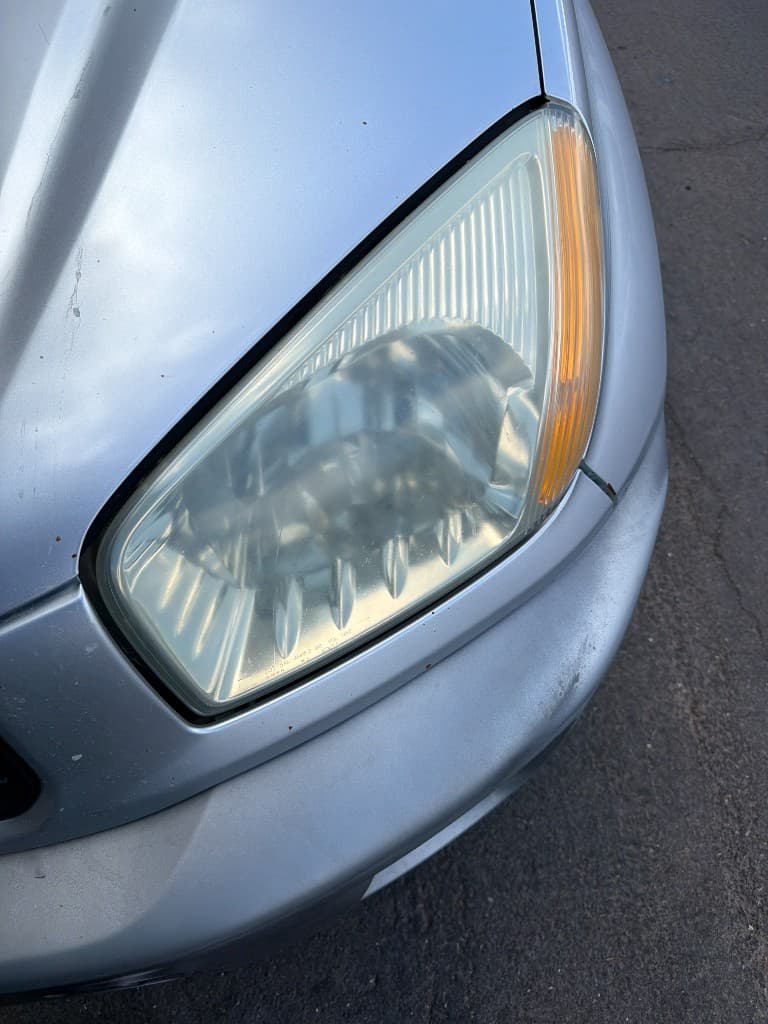 Oxidized headlight lens before restoration