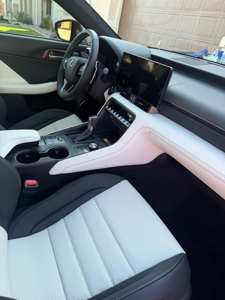 Clean white and black Lexus interior after detailing